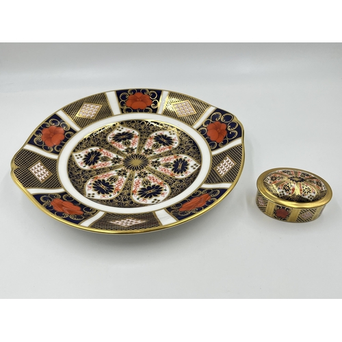 309 - Two pieces of Royal Crown Derby Old Imari 1128 bone china, one lidded trinket box and one dish