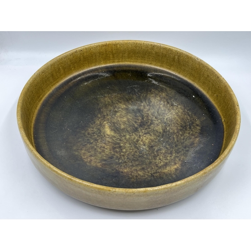 311 - A Thai celadon earthenware bowl - approx. 6.5cm high x 33cm in diameter