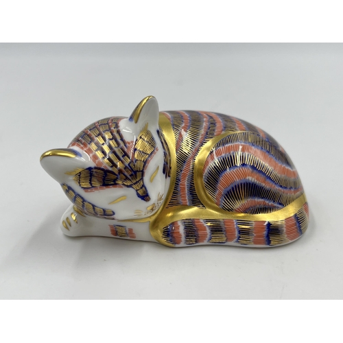 327 - A Royal Crown Derby Sleeping Kitten paperweight with silver stopper