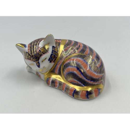 327 - A Royal Crown Derby Sleeping Kitten paperweight with silver stopper