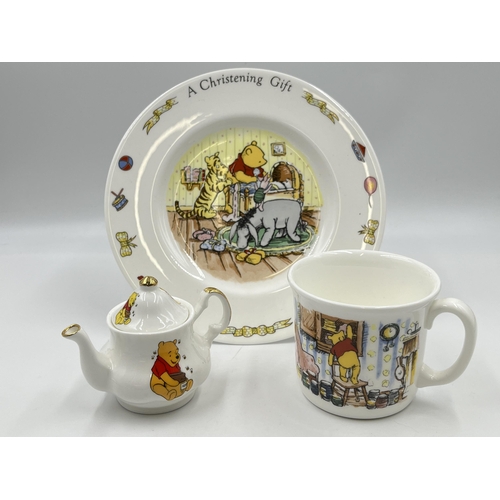 330 - Three pieces of Winnie the Pooh pottery, two Royal Doulton and one Staffordshire