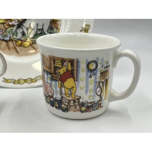 330 - Three pieces of Winnie the Pooh pottery, two Royal Doulton and one Staffordshire