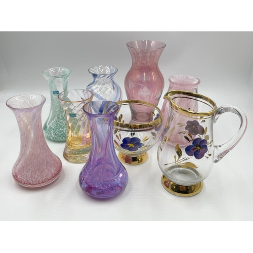 332 - A collection of art glass to include Caithness bud vases etc.