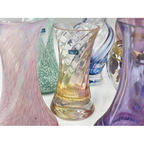 332 - A collection of art glass to include Caithness bud vases etc.