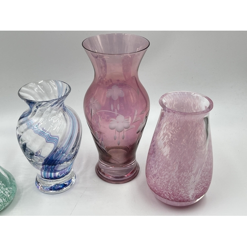 332 - A collection of art glass to include Caithness bud vases etc.