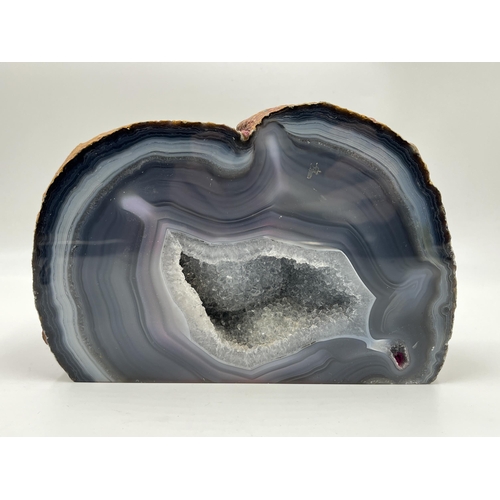 333 - A natural polish agate crystal geode rock - approx. 14cm high x 20cm wide