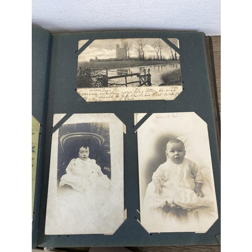 491 - A collection of Victorian and later photographs and postcards