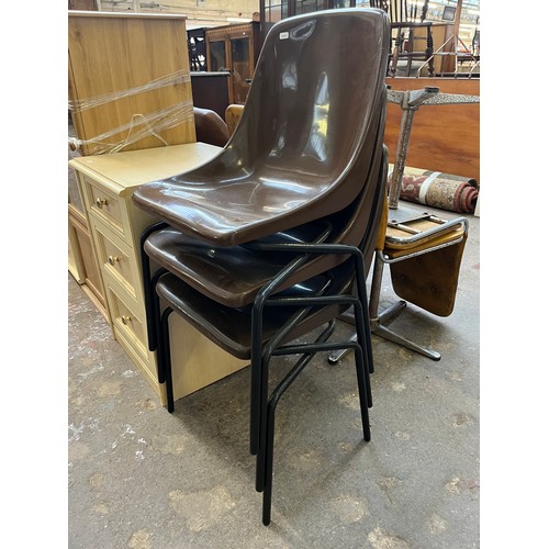 28 - Six pieces of furniture, three brown plastic and black tubular metal stacking chairs, two beech effe... 