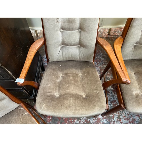 33 - Four mid 20th century teak and fabric upholstered dining chairs