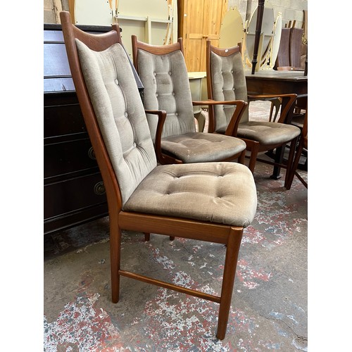 33 - Four mid 20th century teak and fabric upholstered dining chairs