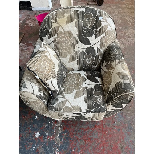 88 - A modern brown and cream floral fabric upholstered armchair