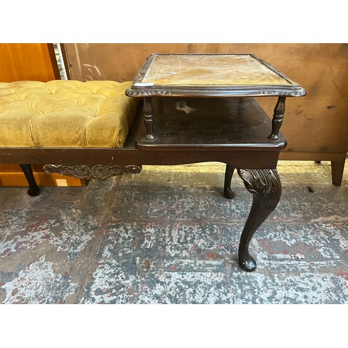 101 - A mahogany and tan leather telephone table with fabric upholstered seat