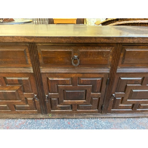 104 - A carved hardwood sideboard - approx. 78cm high x 205cm wide x 42cm deep