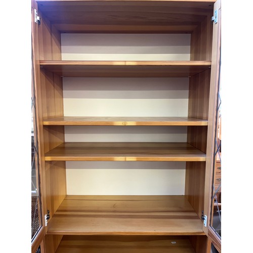 109 - An IKEA pine and lead glazed display cabinet - approx. 204cm high x 80cm wide x 38cm deep