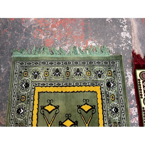 189 - Two machine woven prayer mats, one approx. 116cm x 67cm and one approx. 105cm x 67cm