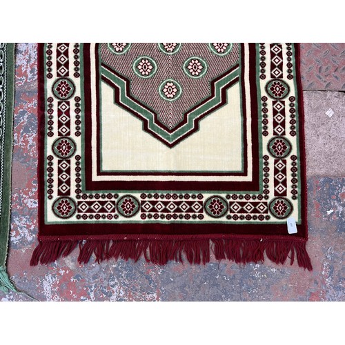 189 - Two machine woven prayer mats, one approx. 116cm x 67cm and one approx. 105cm x 67cm