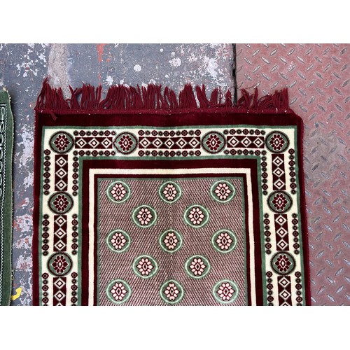 189 - Two machine woven prayer mats, one approx. 116cm x 67cm and one approx. 105cm x 67cm