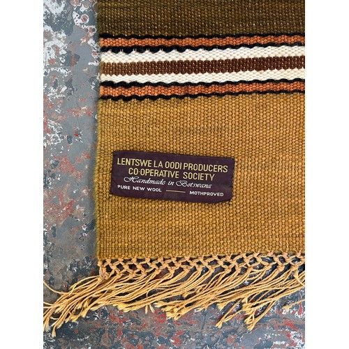 209 - Two items, one 1970s Lenswe La Oodi Producers Co-operative Society pure new wool wall-hanging handma... 