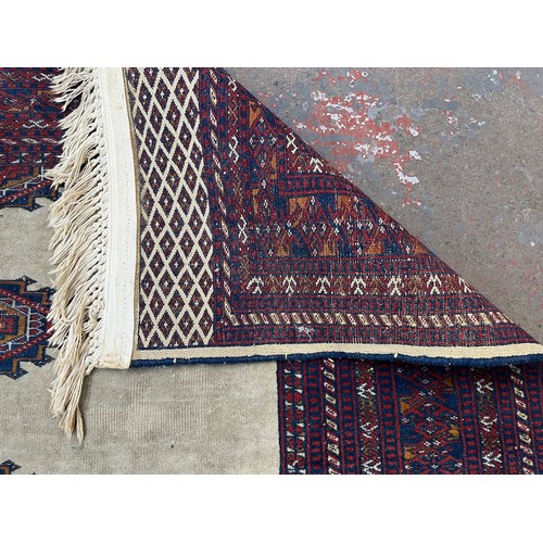 207 - A mid/late 20th century Persian machine woven rug - approx. 186cm x 140cm