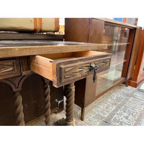 74 - A Gothic style carved hardwood console table with barley twist supports - approx. 75cm high x 100cm ... 