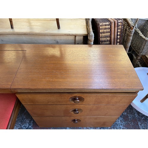 97 - A mid 20th century Meredew teak dressing table and chair - approx. 72cm high x 140cm wide x 40cm dee... 