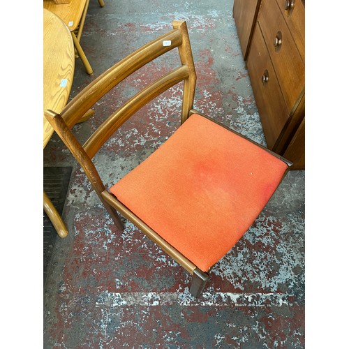 97 - A mid 20th century Meredew teak dressing table and chair - approx. 72cm high x 140cm wide x 40cm dee... 