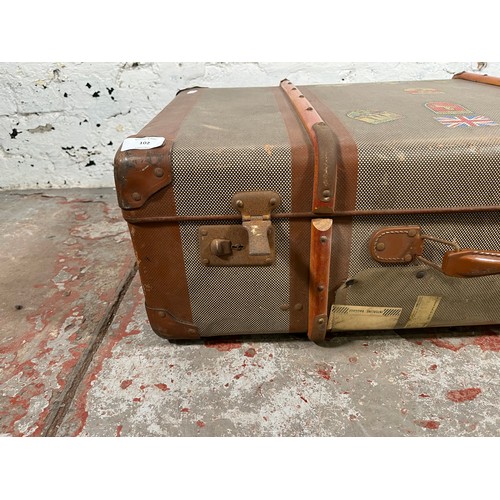 102 - A mid 20th century wooden banded fibreboard suitcase - approx. 24cm high x 70cm wide x 40m deep