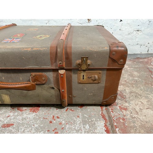 102 - A mid 20th century wooden banded fibreboard suitcase - approx. 24cm high x 70cm wide x 40m deep