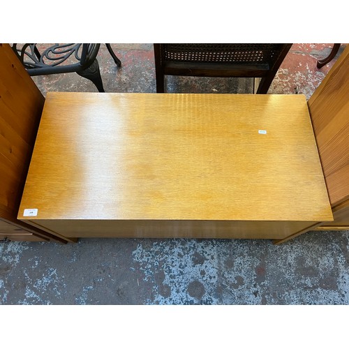 107 - A mid 20th century Meredew oak blanket box - approx. 46cm high x 92cm wide x 46cm deep