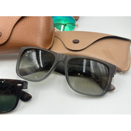 2174 - Five pairs of cased Ray-Ban sunglasses