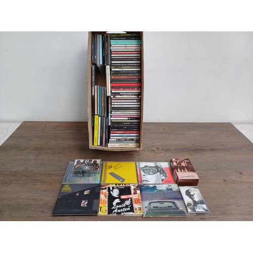 661 - A collection of CDs to include Hot Chip, Artic Monkeys, Arcade Fire, Vampire Weekend, Lou Reed, Amy ... 