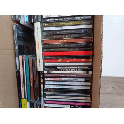 661 - A collection of CDs to include Hot Chip, Artic Monkeys, Arcade Fire, Vampire Weekend, Lou Reed, Amy ... 