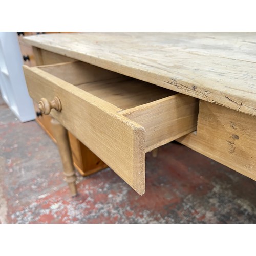 207A - A Victorian pine farmhouse dining table - approx. 74cm high x 68cm wide x 118cm long