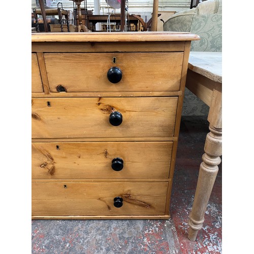 205 - A Victorian pine chest of drawers with ebonised handles - approx. 85cm high x 102cm wide x 46cm deep