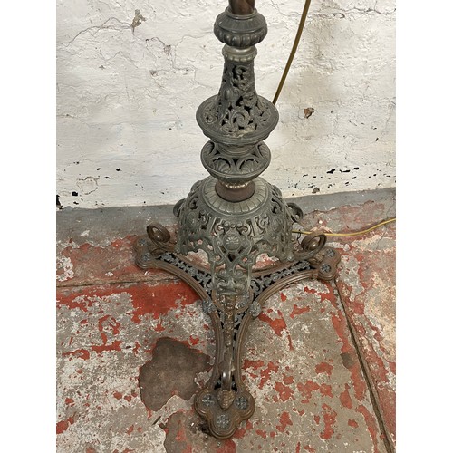 210 - A late 19th century copper and cast metal telescopic oil lamp with mottled glass reservoir and opaqu... 