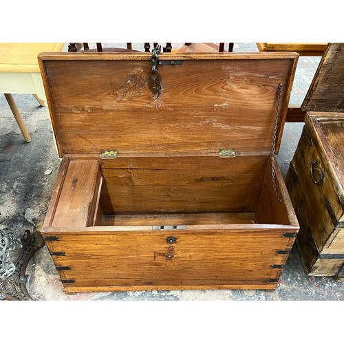 212 - A 19th century camphor wood and metal banded blanket box - approx. 45cm high x 90cm wide x 42cm deep