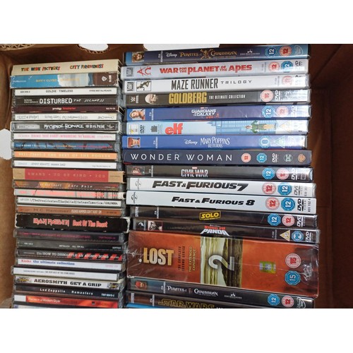 667 - A collection of sealed DVDs and unsealed CDs to include Pink Floyd, Oasis, Pearl Jam, The Prodigy, R... 