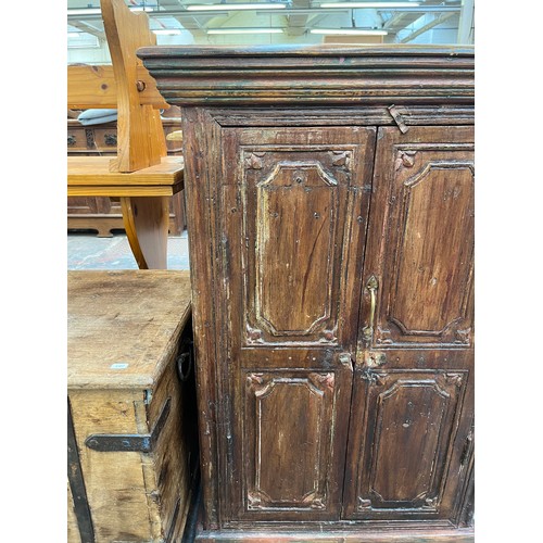 216 - An Indian sheesham wood two door cabinet - approx. 104cm high x 71cm wide x 37cm deep