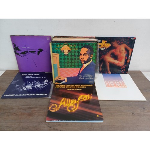 664 - A collection of jazz LP vinyl records to include Dizzy Gillespie, Charlie Parker, Maynard Ferguson, ... 