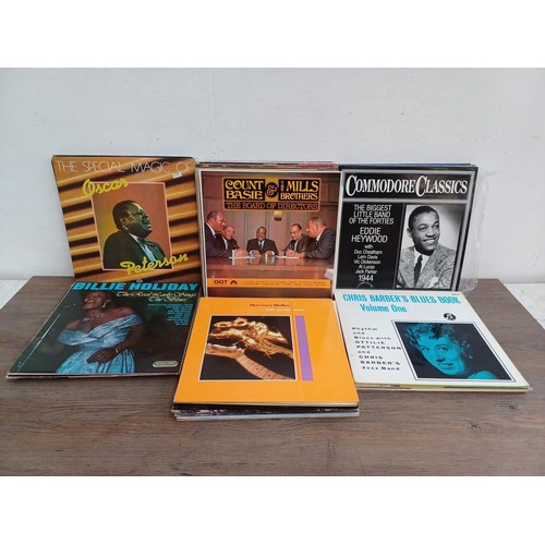 664 - A collection of jazz LP vinyl records to include Dizzy Gillespie, Charlie Parker, Maynard Ferguson, ... 