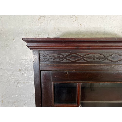 218 - A late 19th/early 20th century carved mahogany wall mountable display cabinet - approx. 74cm high x ... 