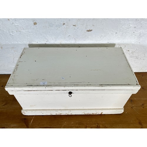 219 - A Victorian white painted pine blanket box - approx. 37cm high x 77cm wide x 40cm deep