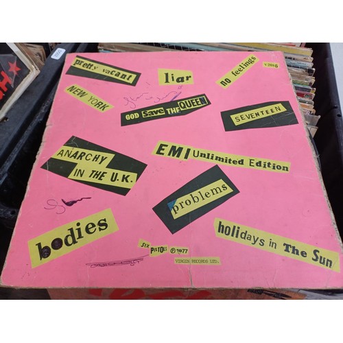 655A - Two boxes containing a large collection of vinyl records to include Black Sabbath, The Stranglers, J... 