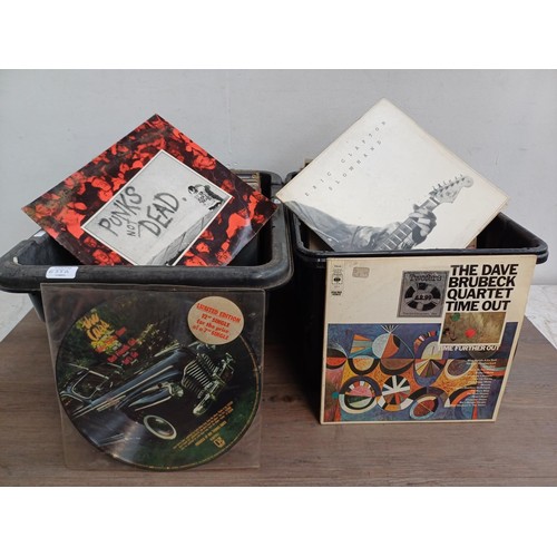 655A - Two boxes containing a large collection of vinyl records to include Black Sabbath, The Stranglers, J... 