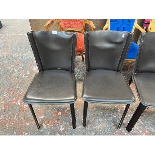 226 - Four Frag brown leather dining chairs