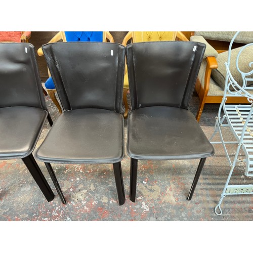 226 - Four Frag brown leather dining chairs