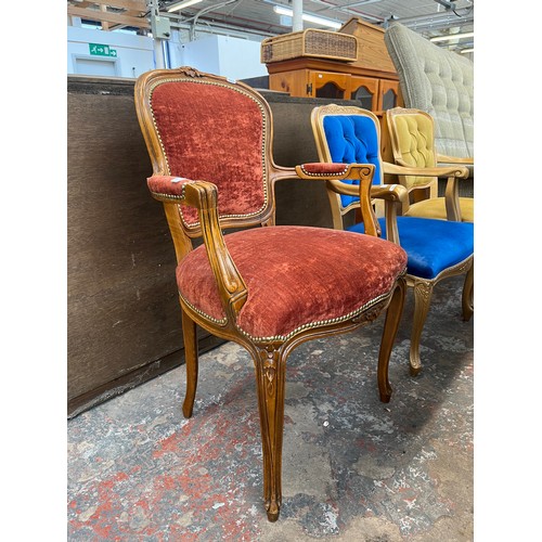 228 - A French Louis XVI style carved walnut and red fabric upholstered open armchair