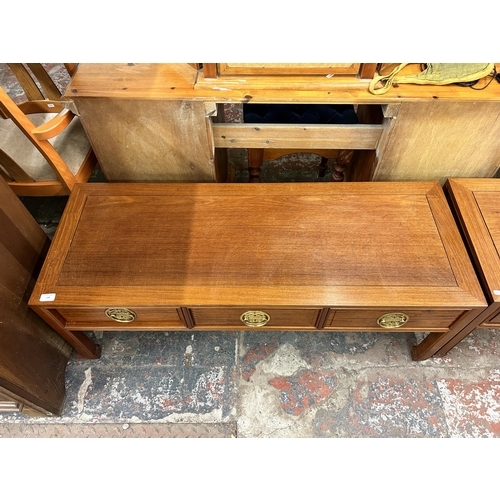 179 - A Chinese hardwood three drawer coffee table - approx. 46cm high x 46cm wide x 123cm long