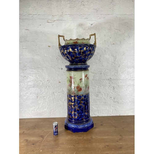 438 - A Victorian transfer printed pottery jardinière and stand - approx. 114cm high