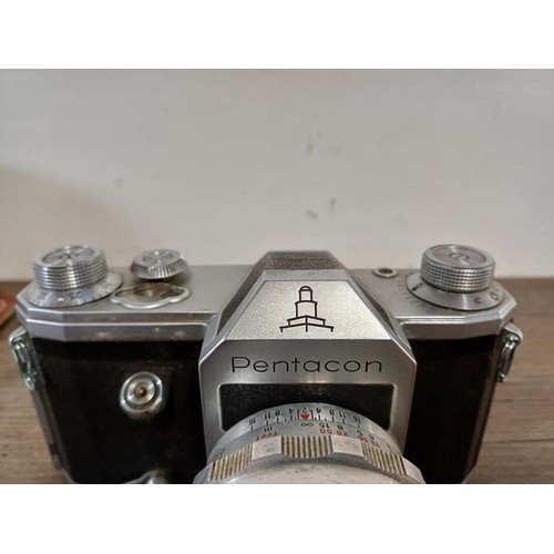 678 - Two cased Zeiss Ikon items, one mid 20th century Pentacon (export branding) Zeiss Ikon Contax D 35mm... 